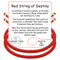 Graphic design by Cherry Tree Collection for the Red String of Destiny bracelet, featuring a vibrant red braided cord with gold beads displayed on a white card, accompanied by text detailing its meaning and "Knotted By Hand" crafting