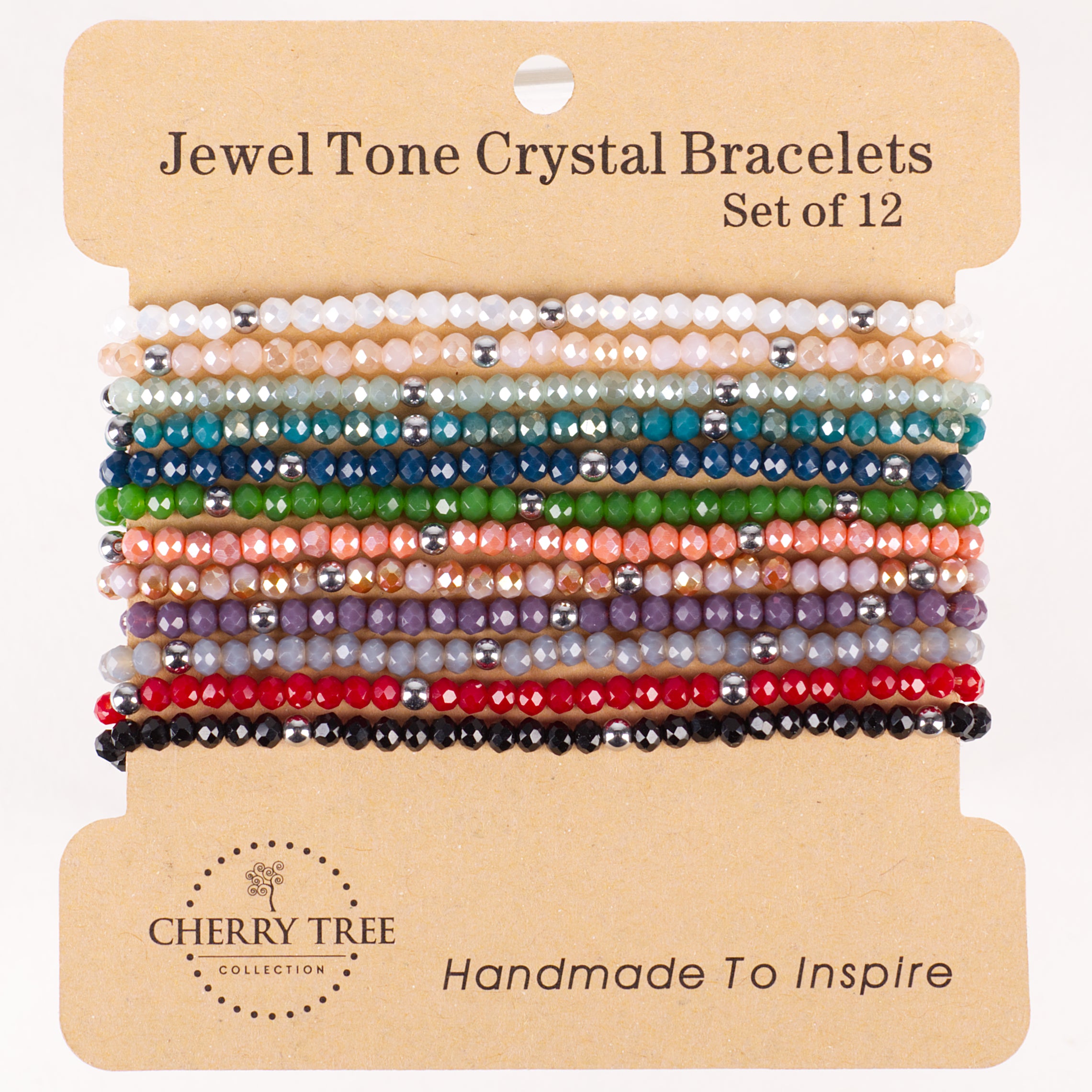 Cherry Tree Collection beaded bracelets: a set of twelve Jewel Tone Crystal Bracelets on a kraft paper display card, showcasing faceted crystal beads in a rainbow of hues like pastel pink, deep teal, and bright red, accented with small silver-colored spacer beads, and featuring the brand's "Handmade To Inspire" text